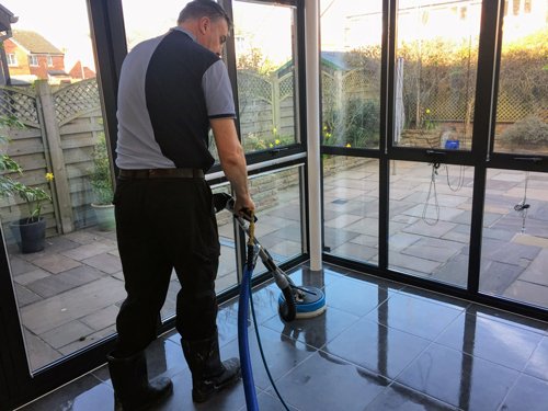 Kevin using a Hydra Force to clean Porcelain tiles