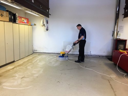 Kevin cleaning white Altro flooring with a Klindex Rocky